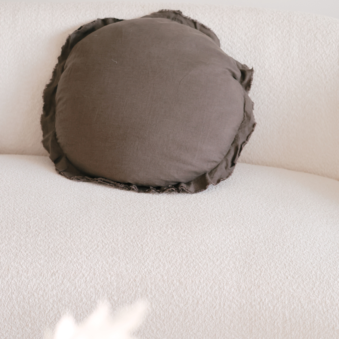 100% flax linen round feather filled cushion in deep moss, close-up