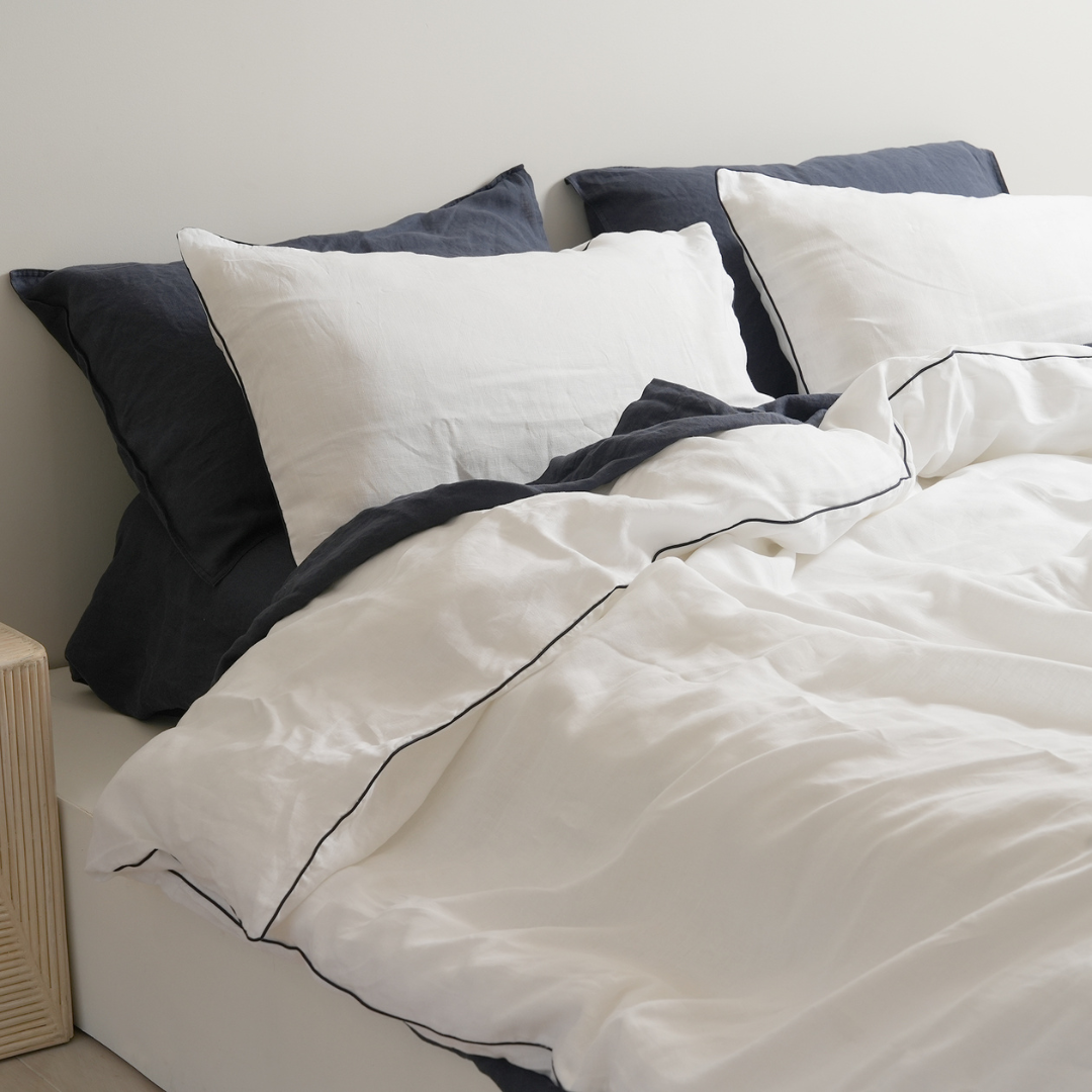100% french flax linen piped duvet cover set in white/ navy, close-up