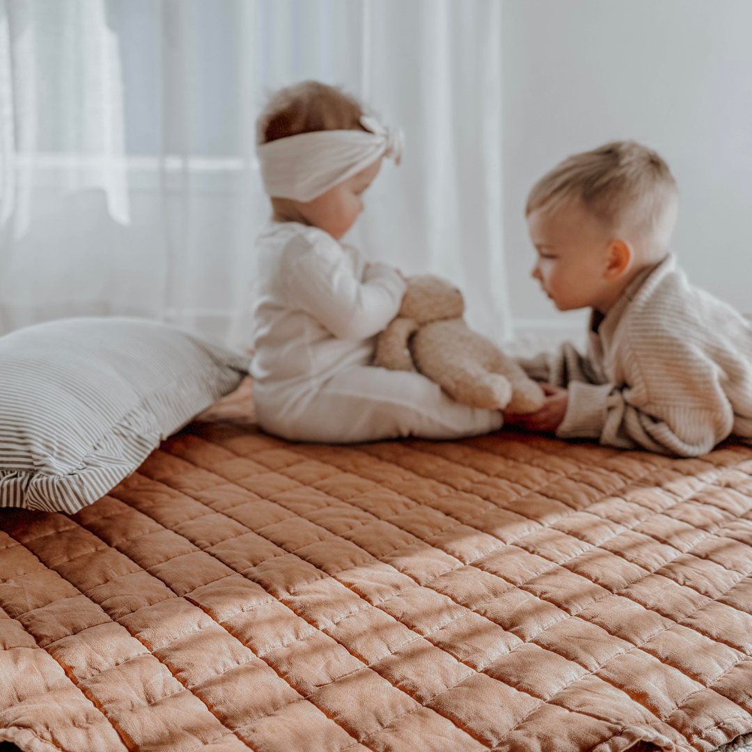 100% french flax linen playmat in hazelnut, close-up