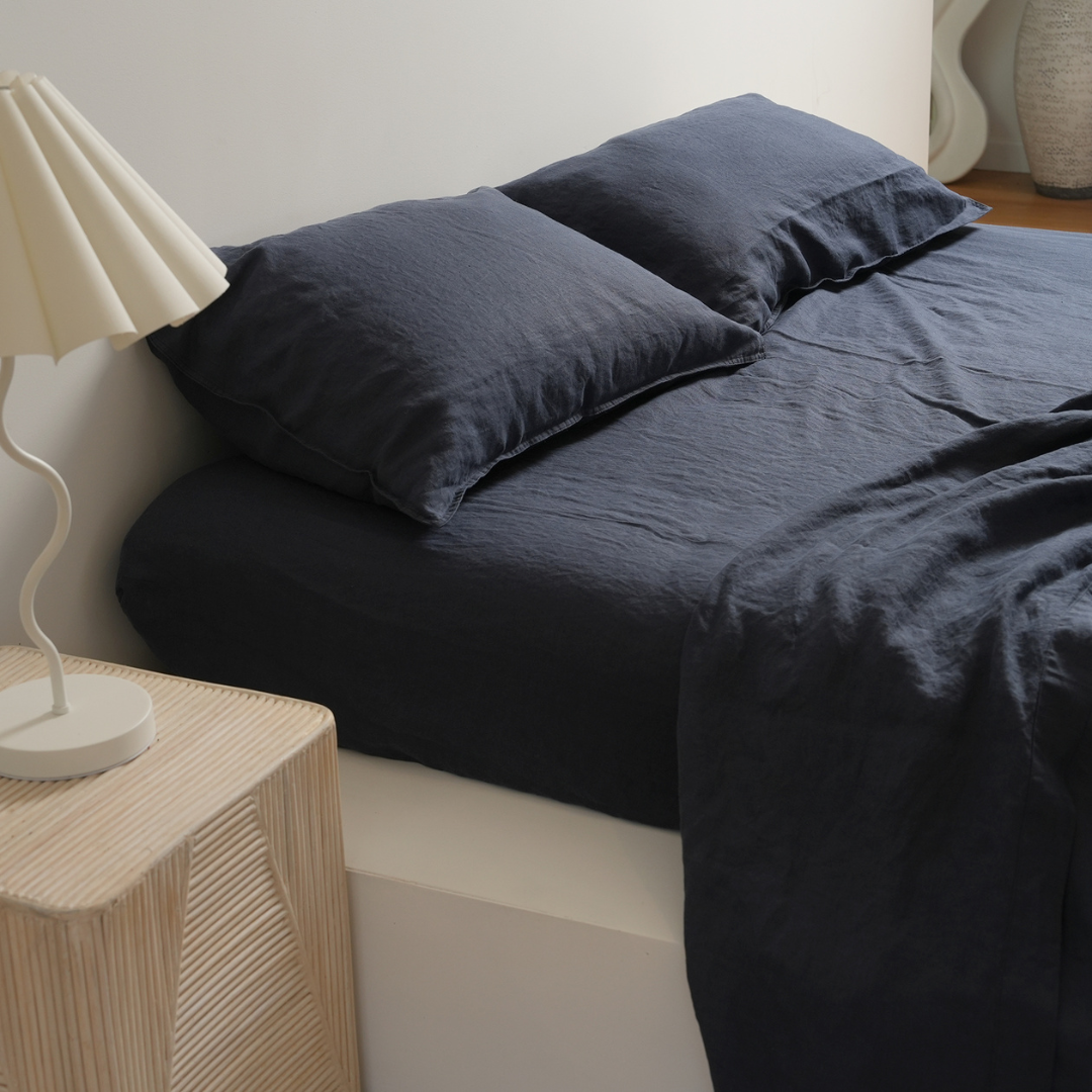 100% french flax linen sheet set in midnight, styled shot