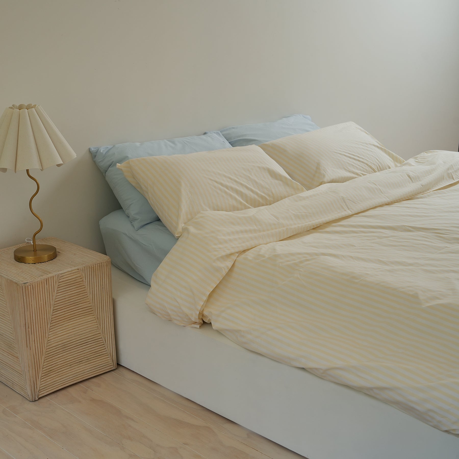100% stonewashed cotton duvet set in butter stripe, side view