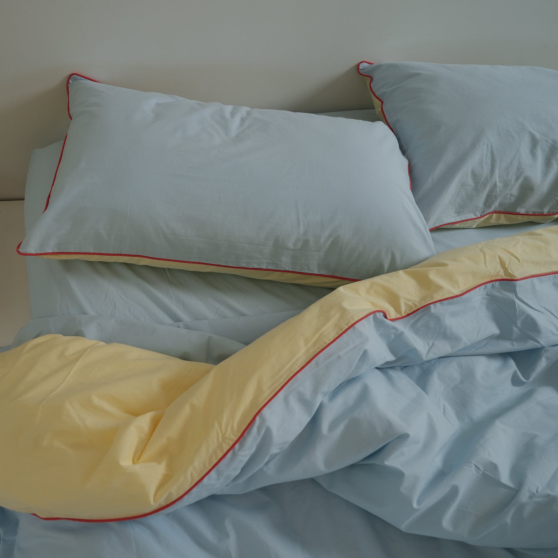 100% stonewashed cotton pillowcase pair in butter/sky reversible, detail view