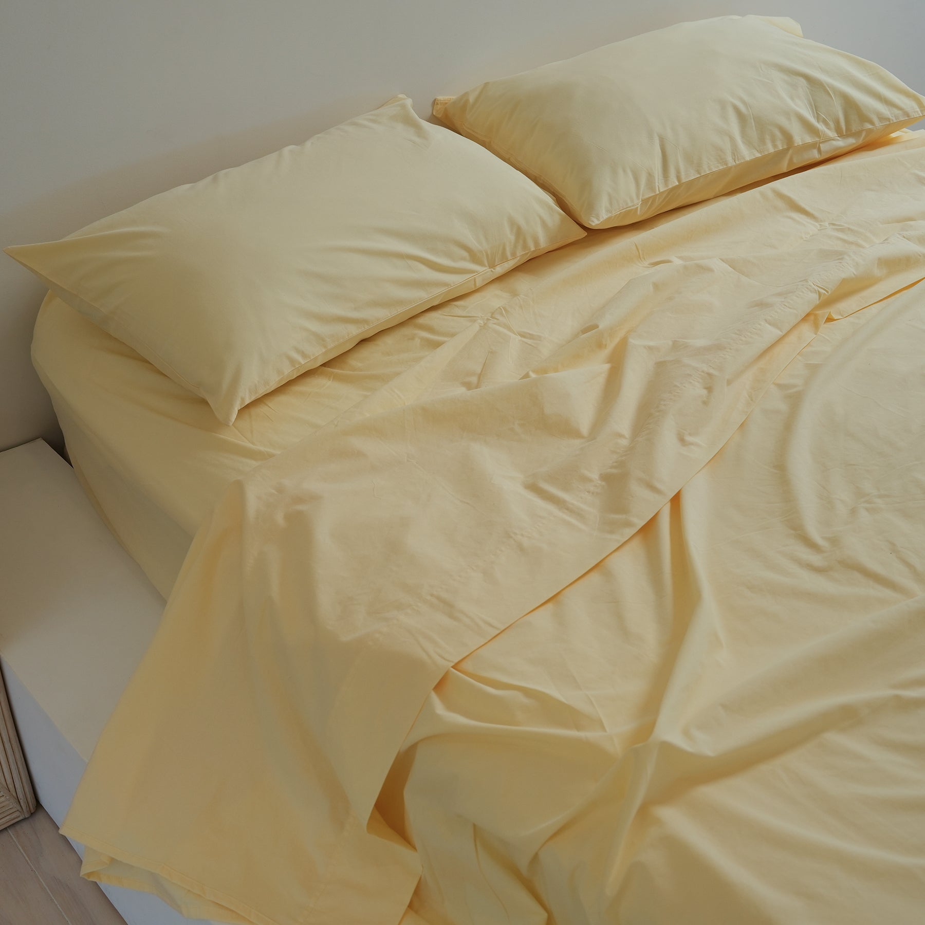 100% stonewashed cotton sheet set in butter, detail view