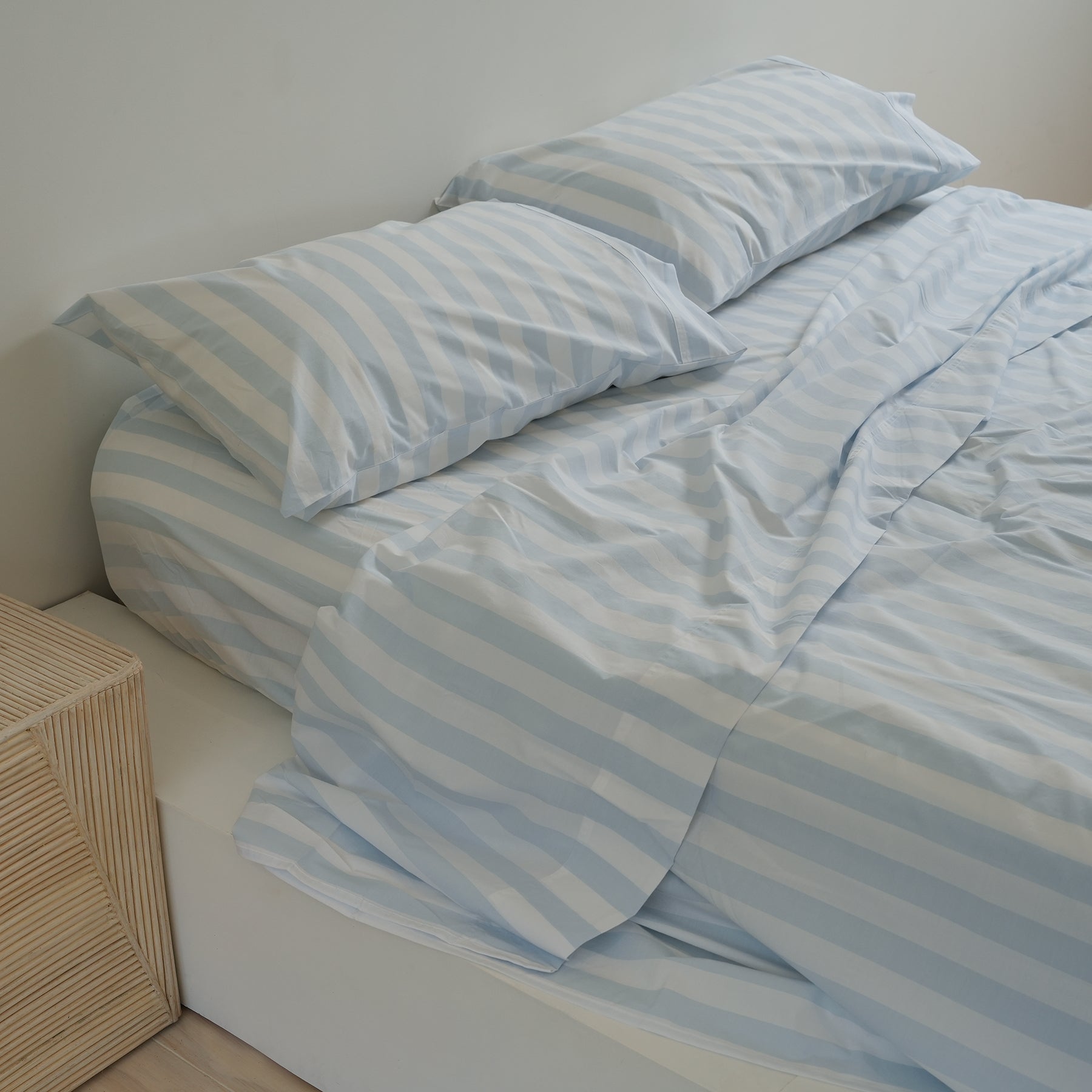 100% stonewashed cotton sheet set in sky blue stripe, side view