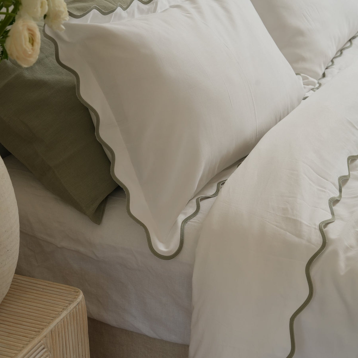 Celine duvet set in white/sage, styled shot