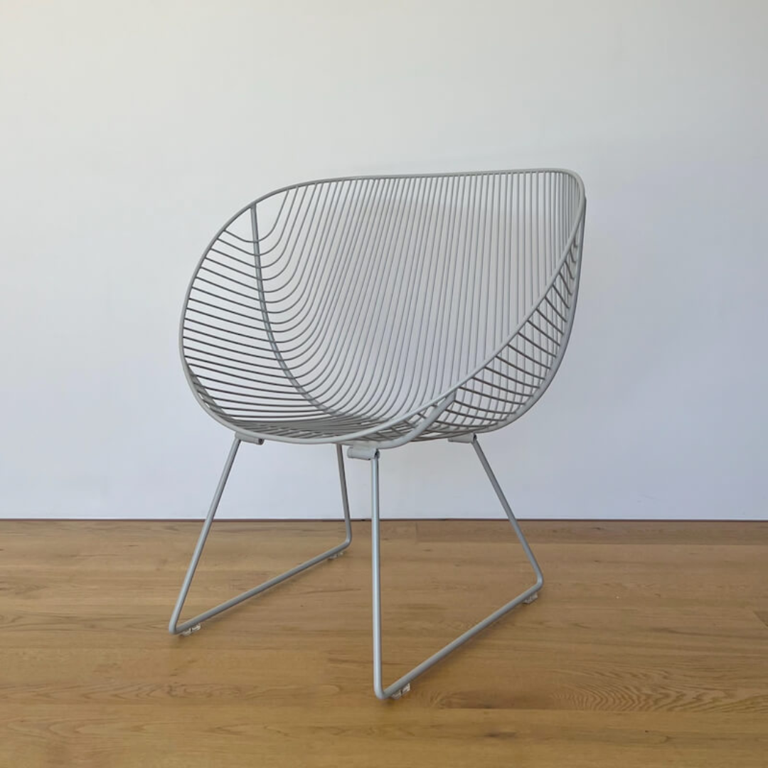 Coromandel chair in stainless, side view