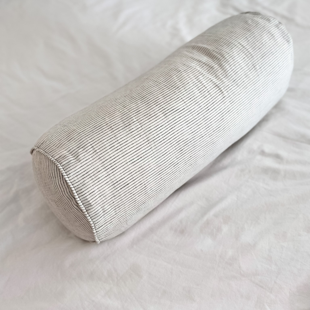 French flax linen feather filled bolster cushion in Charcoal Pinstripe side view