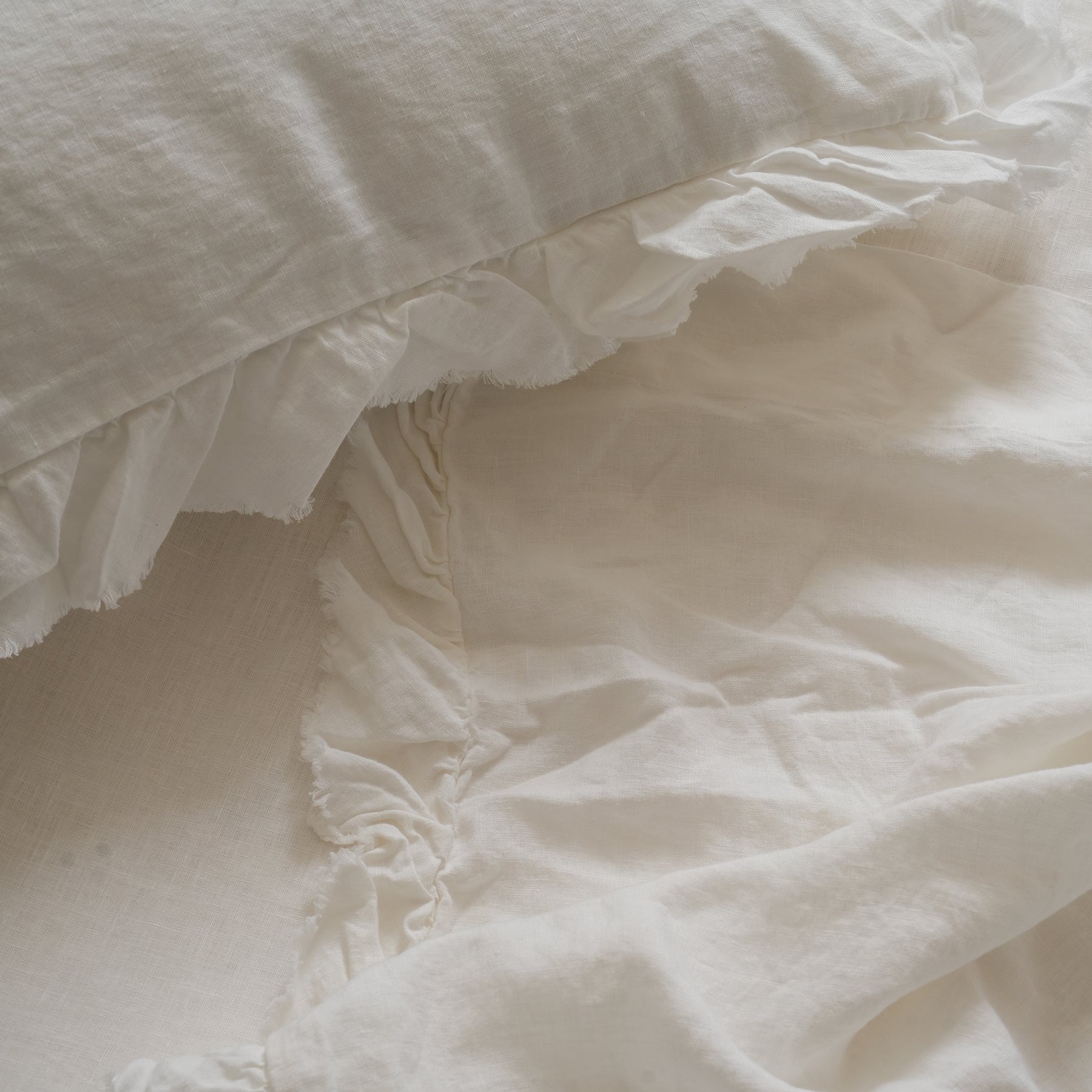 French flax linen ruffle edge sheet set in White detail view