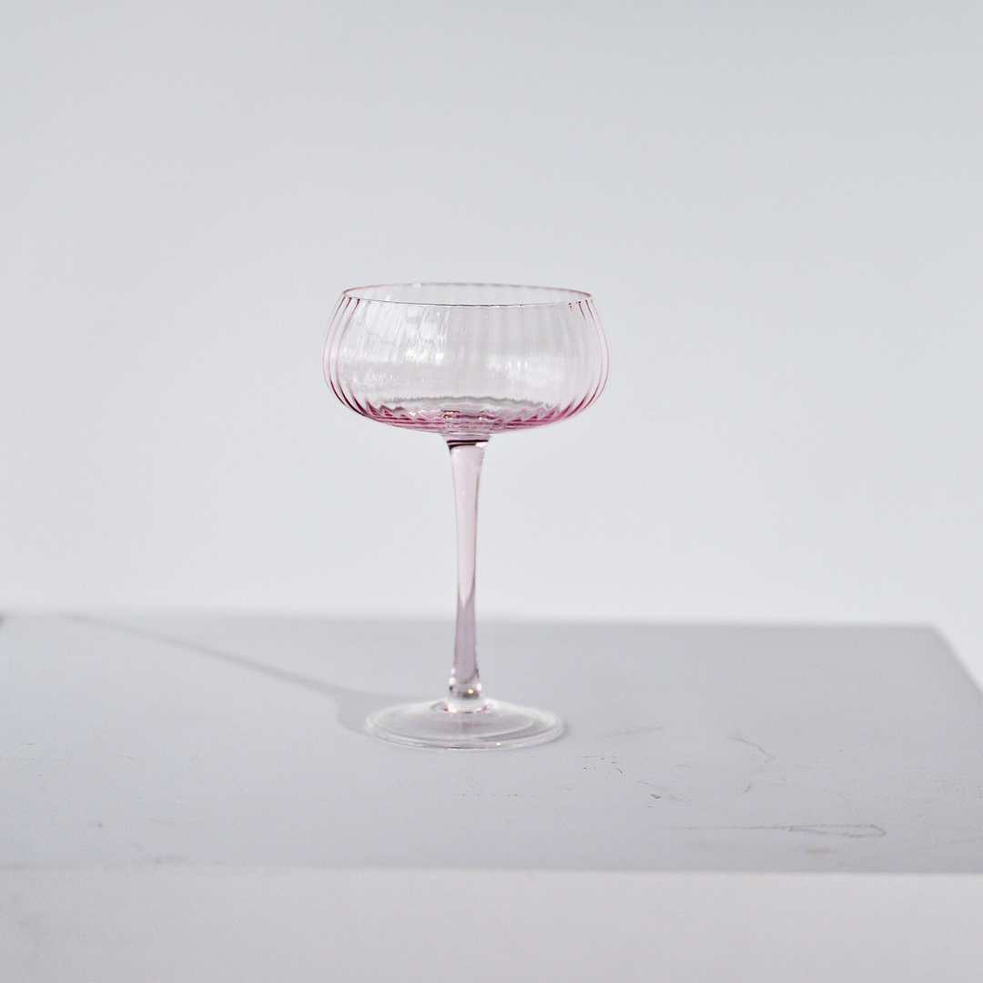 Ribbed champagne coupe in Set 4 Blush close-up of fabric