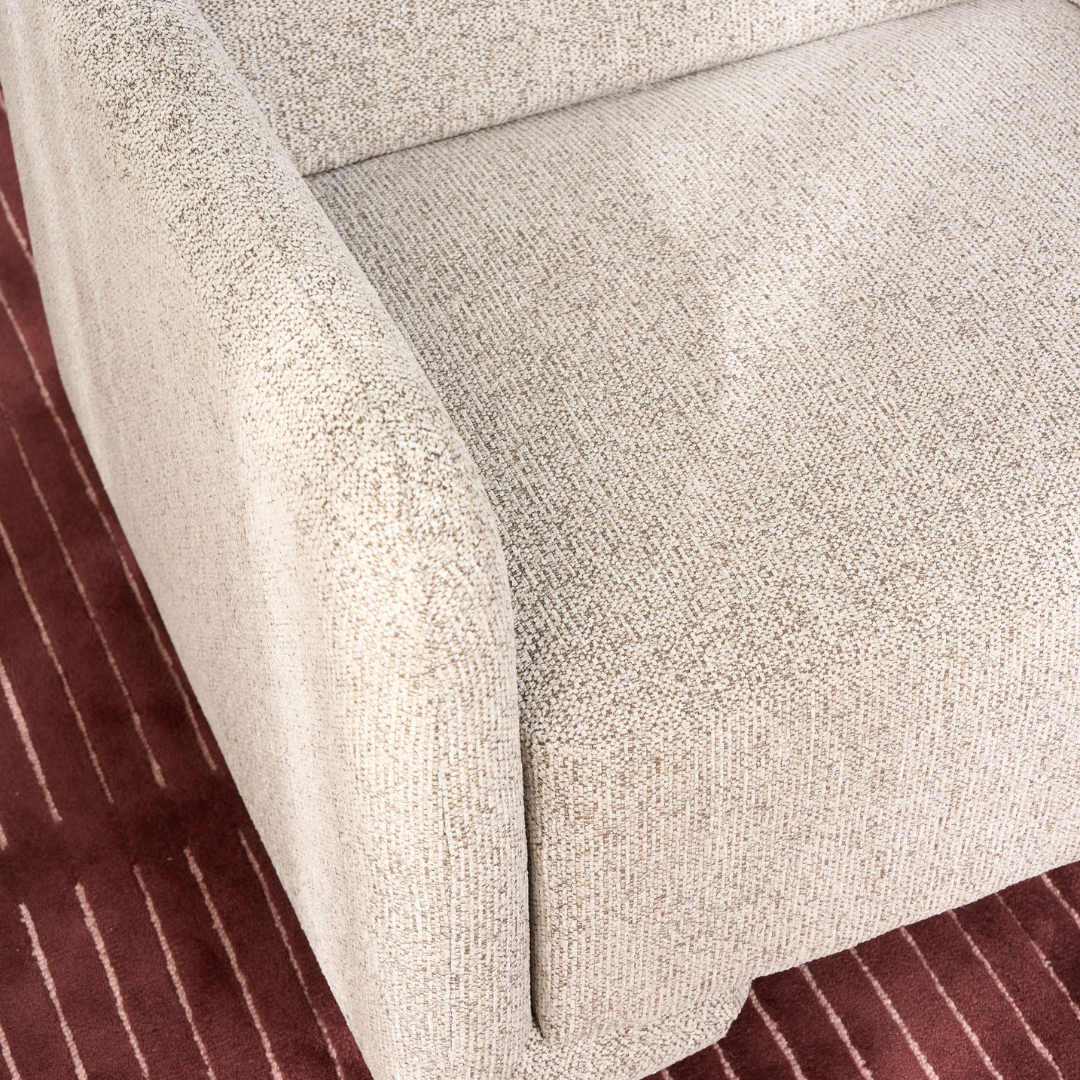 Tanner chair in Espresso, low-slung seat, textured fabric, styled view