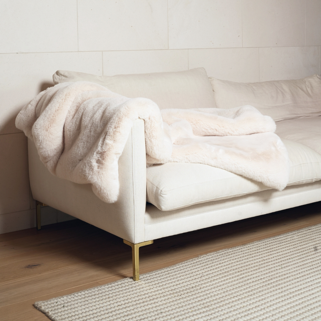 Vegan fur throw in big bear cream, side view