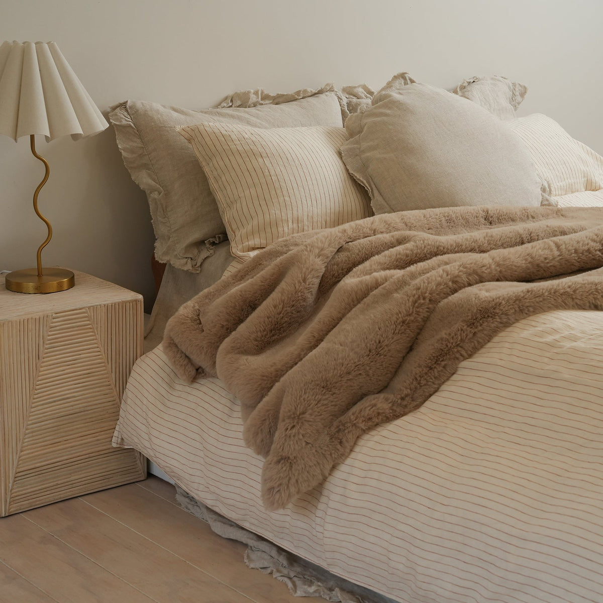 Vegan fur throw in big bear pewter, styled shot