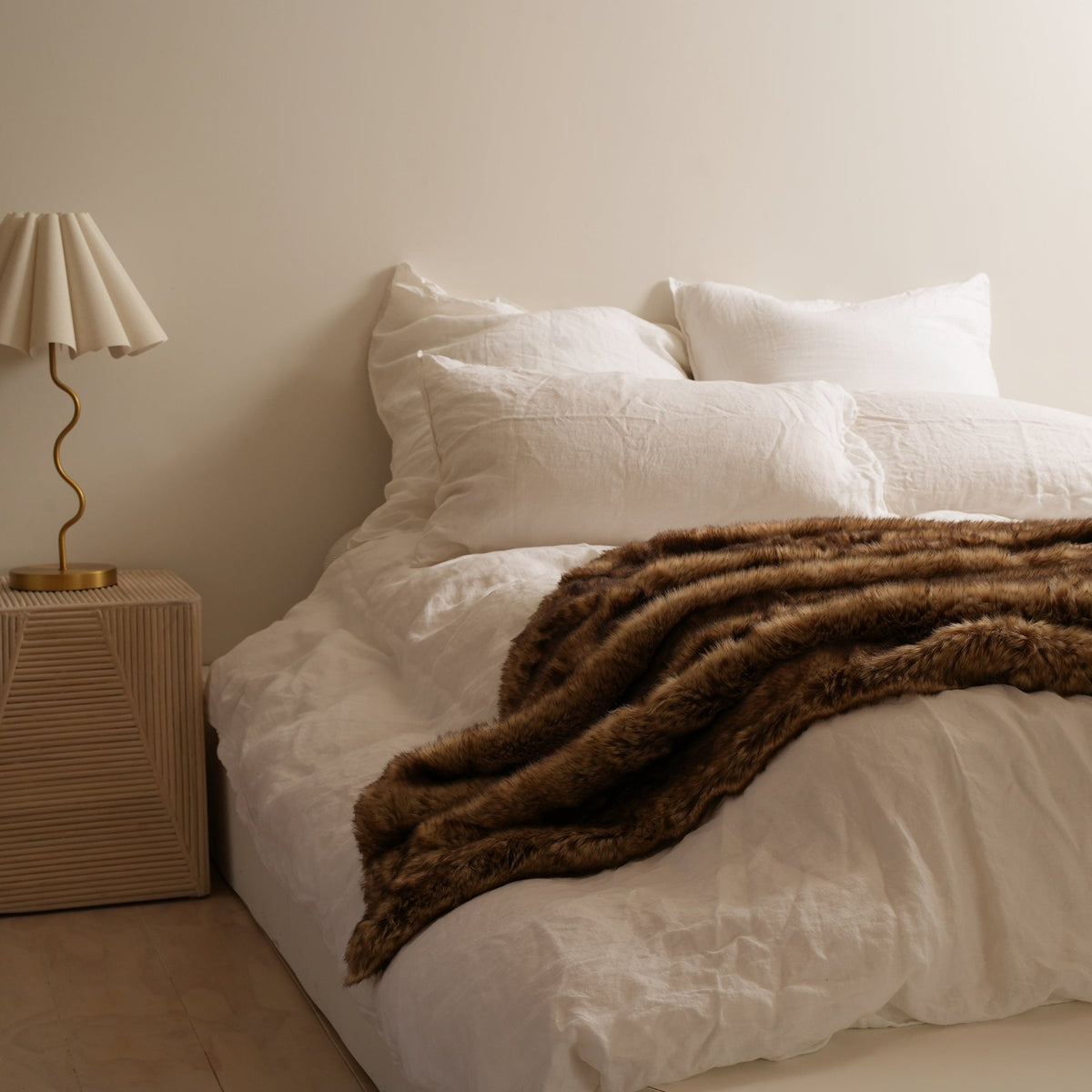 Vegan fur throw in Wolf side view