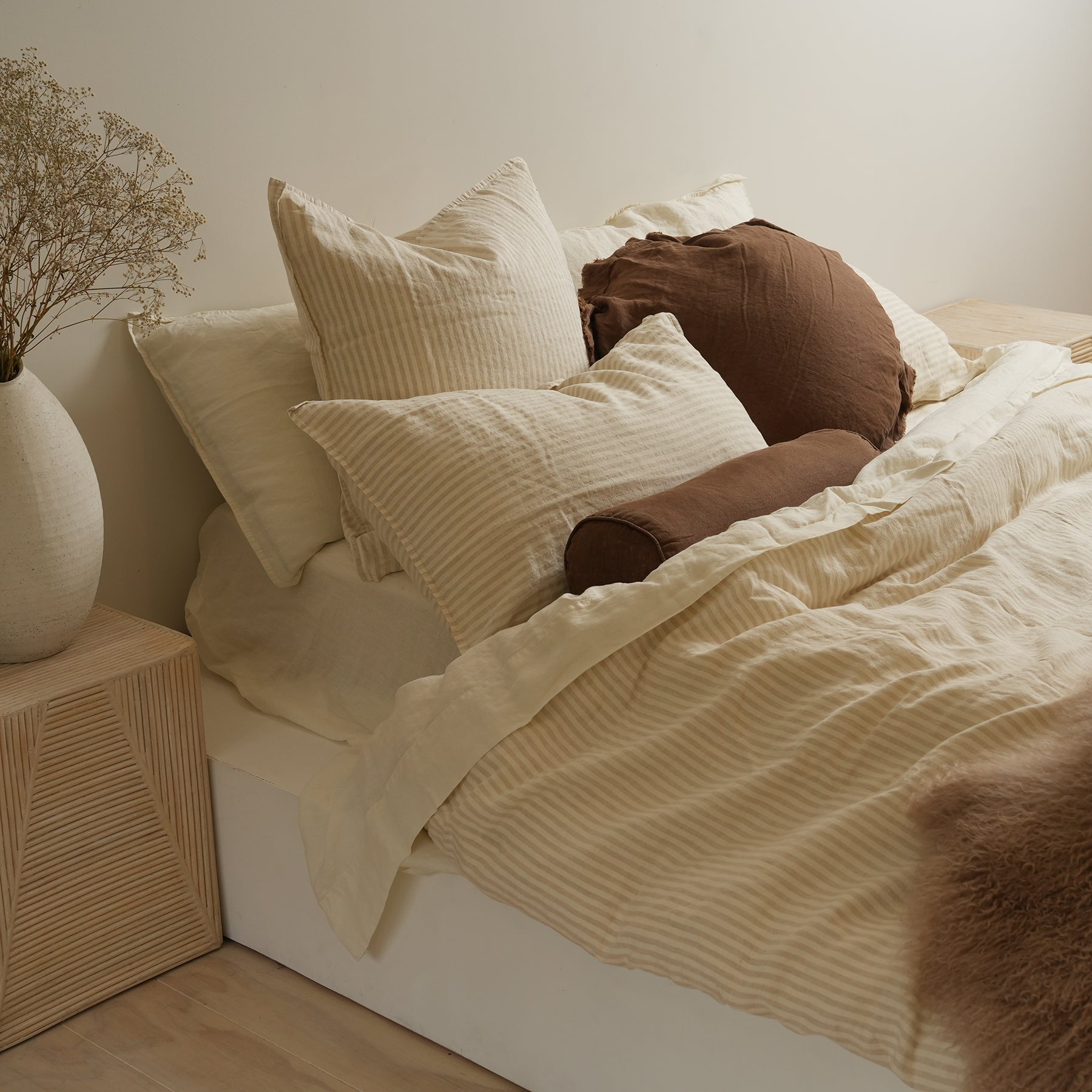 100% french flax linen feather filled bolster cushion in mocha, detail view
