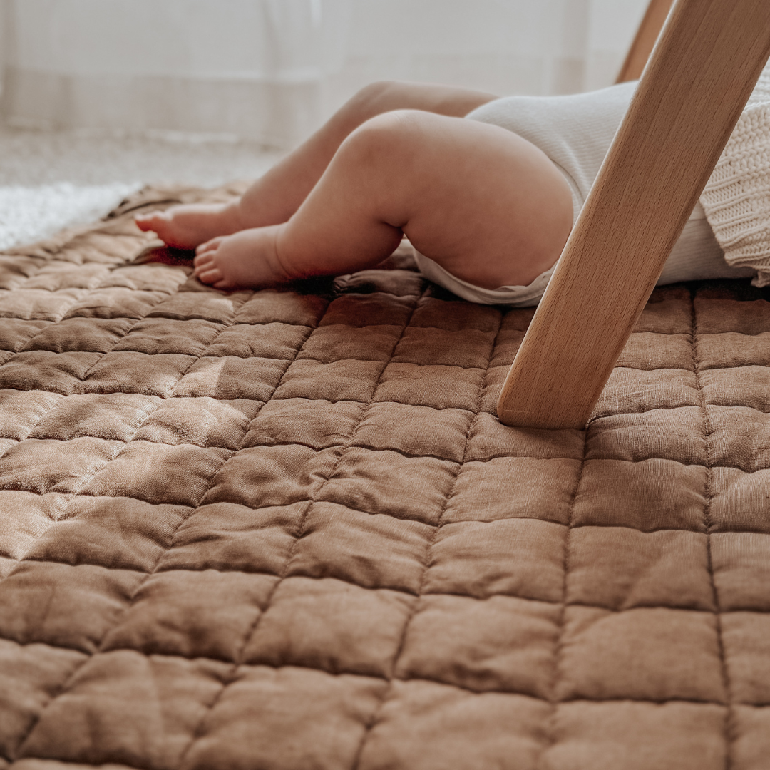 100% french flax linen playmat in mocha, close-up