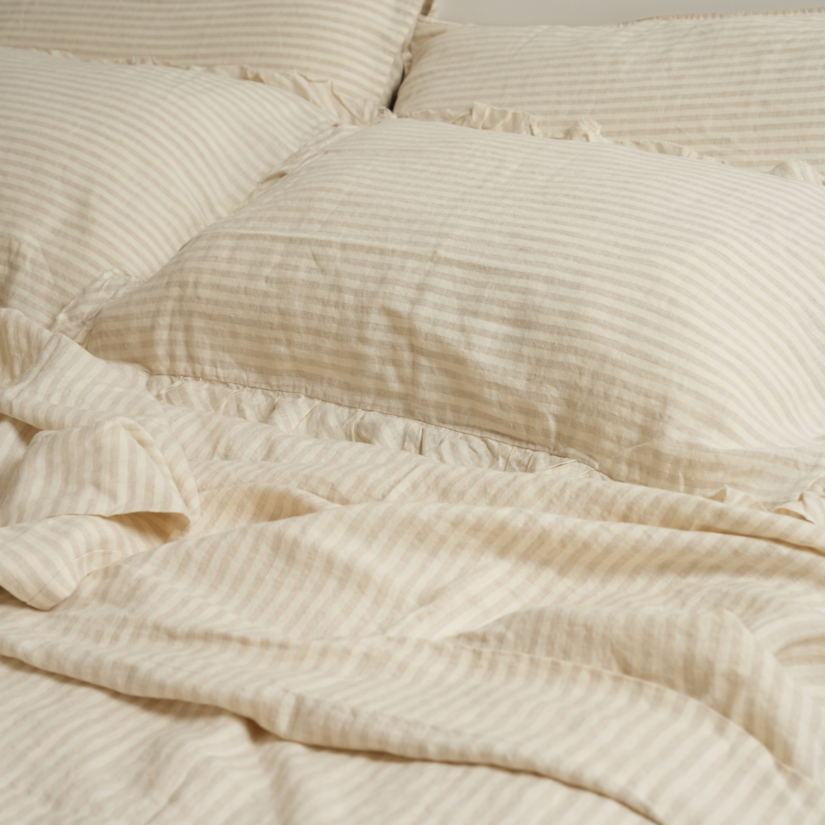 100% french flax linen ruffle edge pillowcase pair in sand stripe, close-up