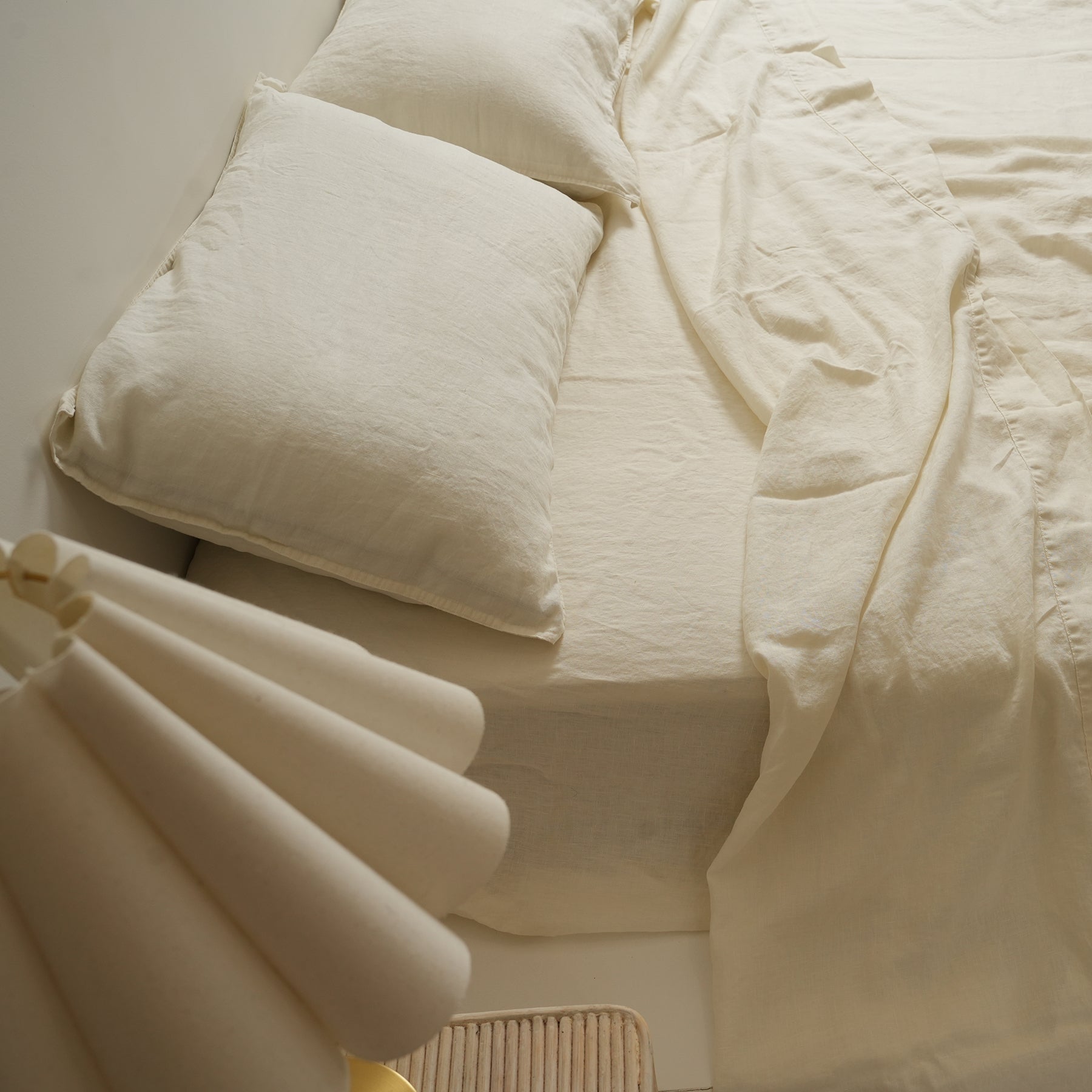 100% french flax linen sheet set in milk, side view