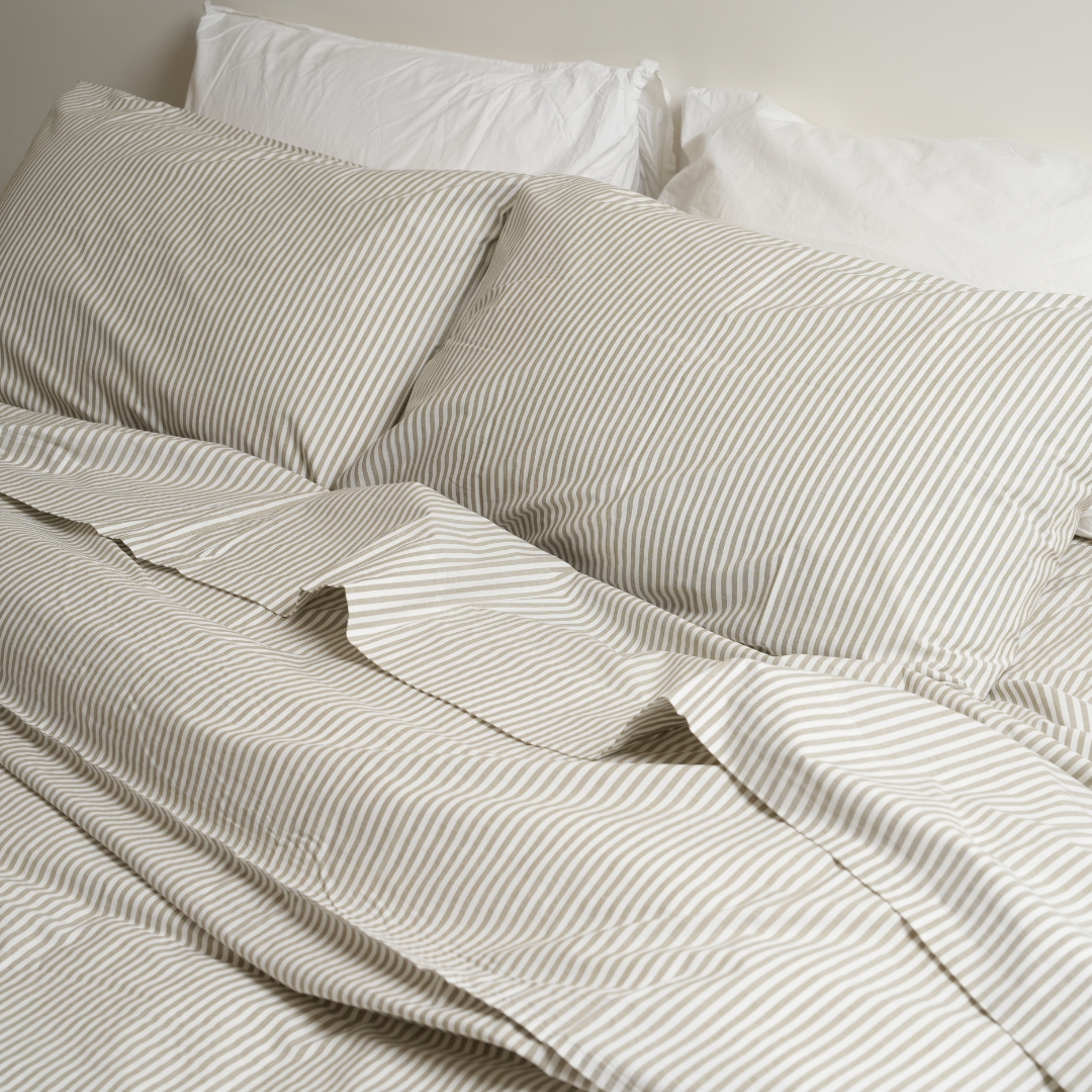 100% stonewashed cotton duvet set in olive stripe, close-up