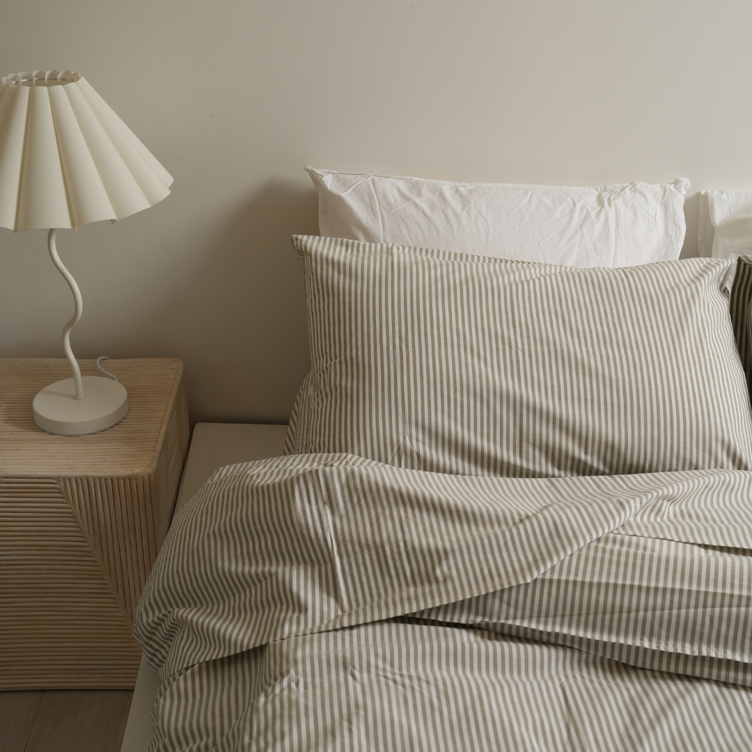 100% stonewashed cotton duvet set in olive stripe, styled shot