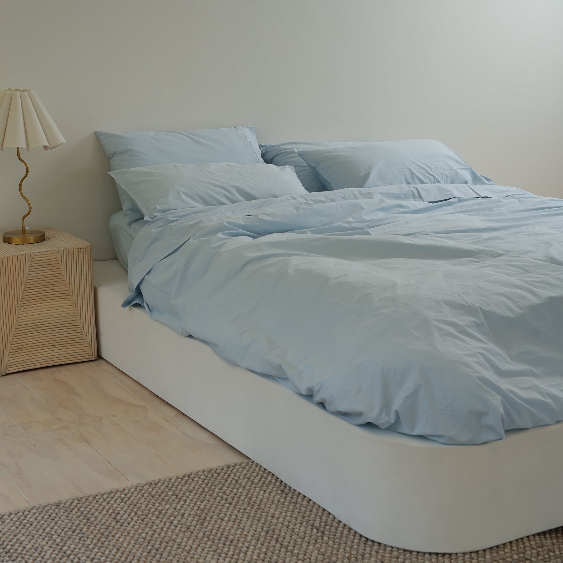 100% stonewashed cotton duvet set in sky blue, side view