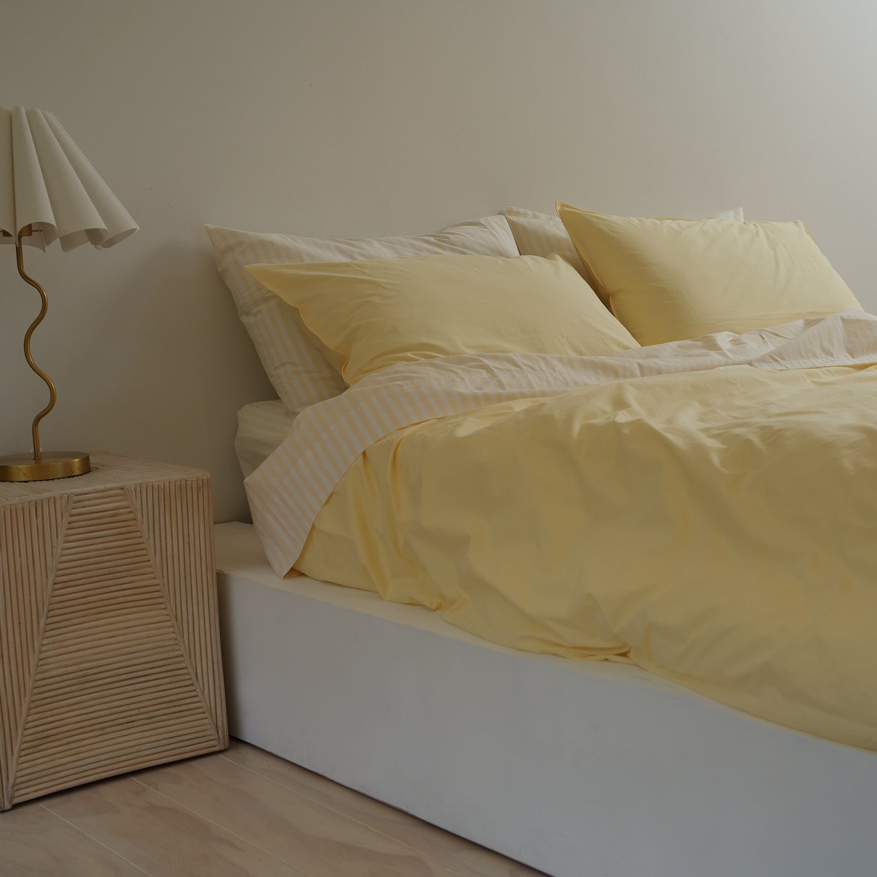 100% stonewashed cotton sheet set in butter stripe, detail view