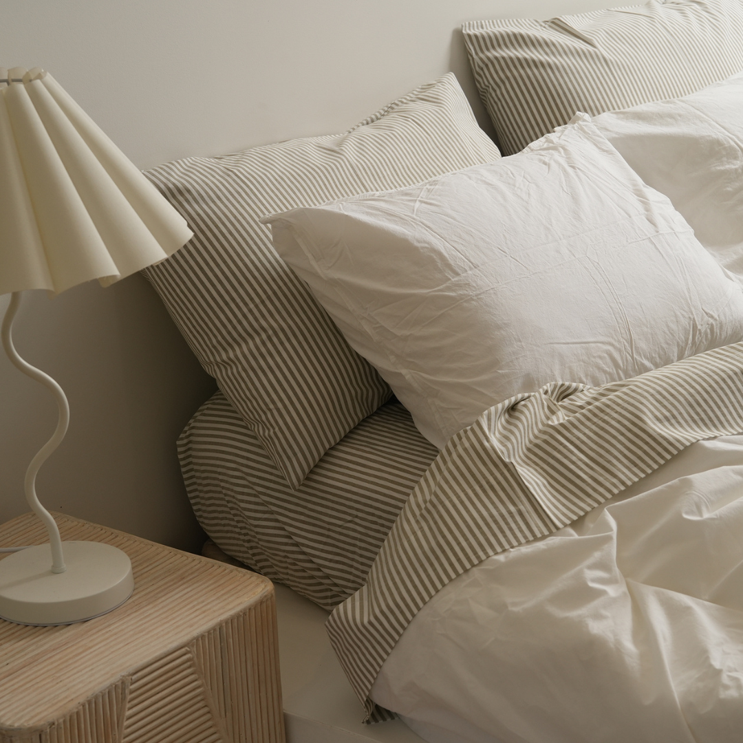 100% stonewashed cotton sheet set in olive stripe, styled shot