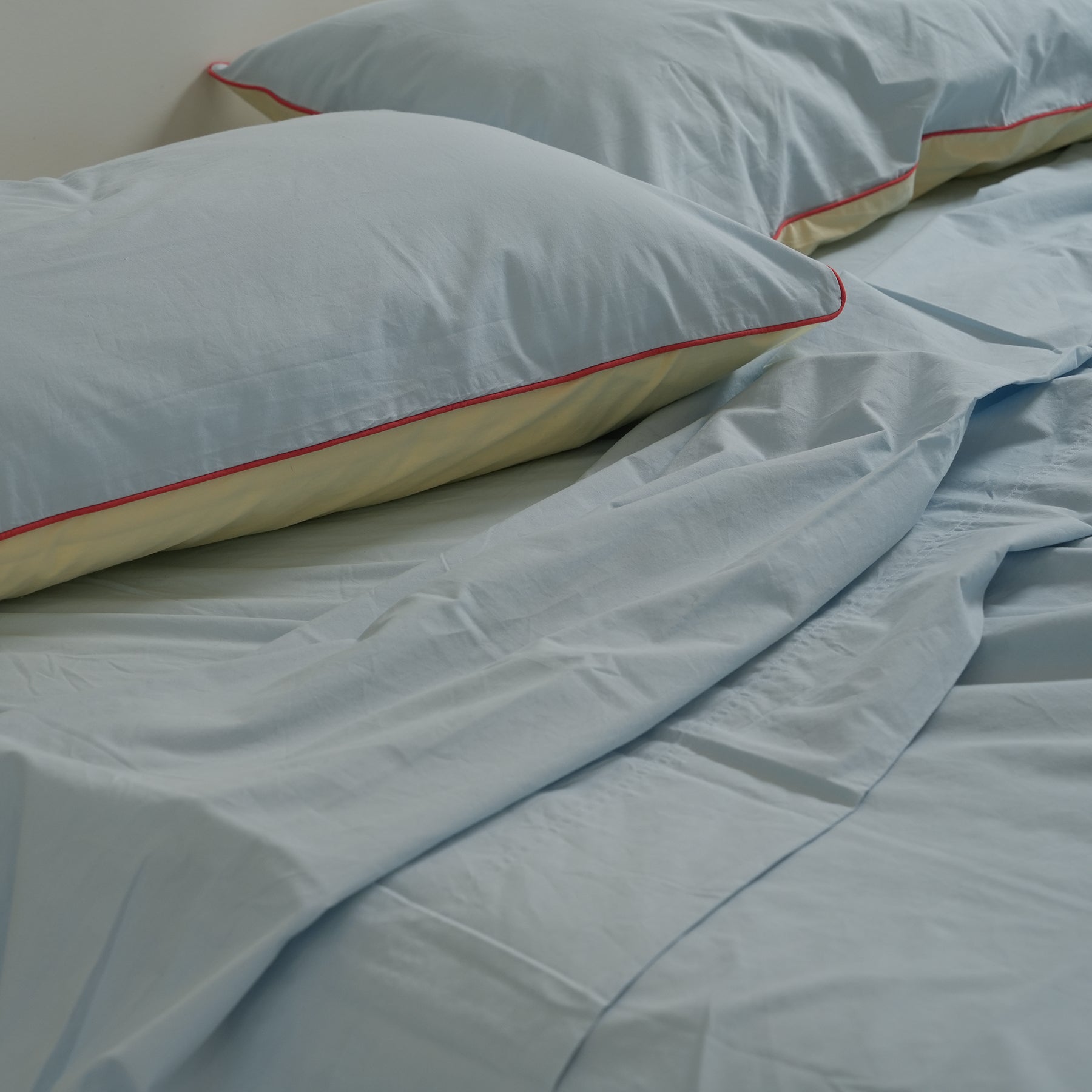 100% stonewashed cotton sheet set in sky blue, close-up
