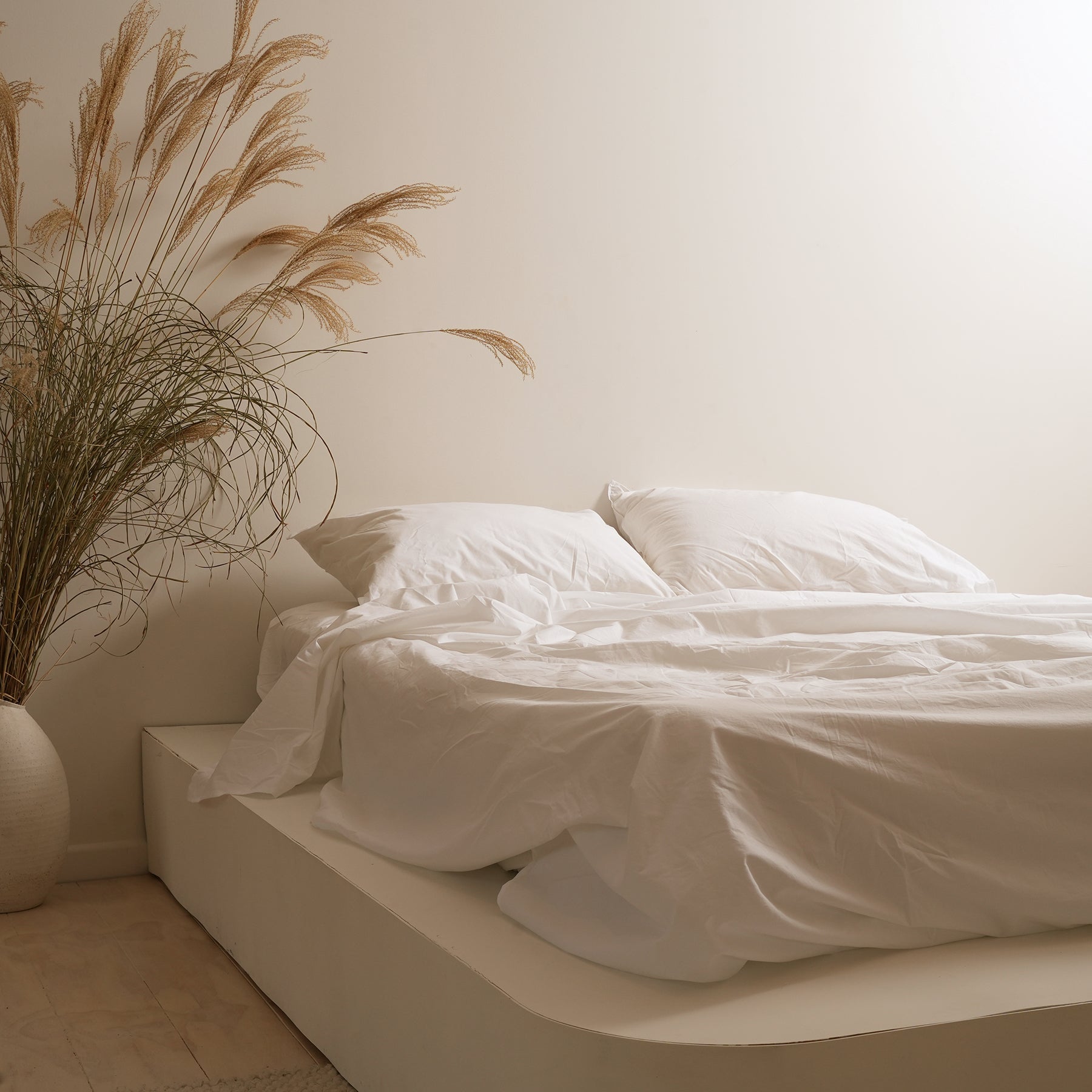 100% stonewashed cotton sheet set in white, close-up