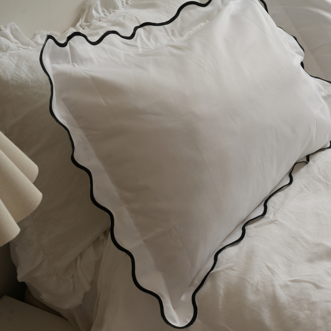 Celine pillowcase pair in black, side view