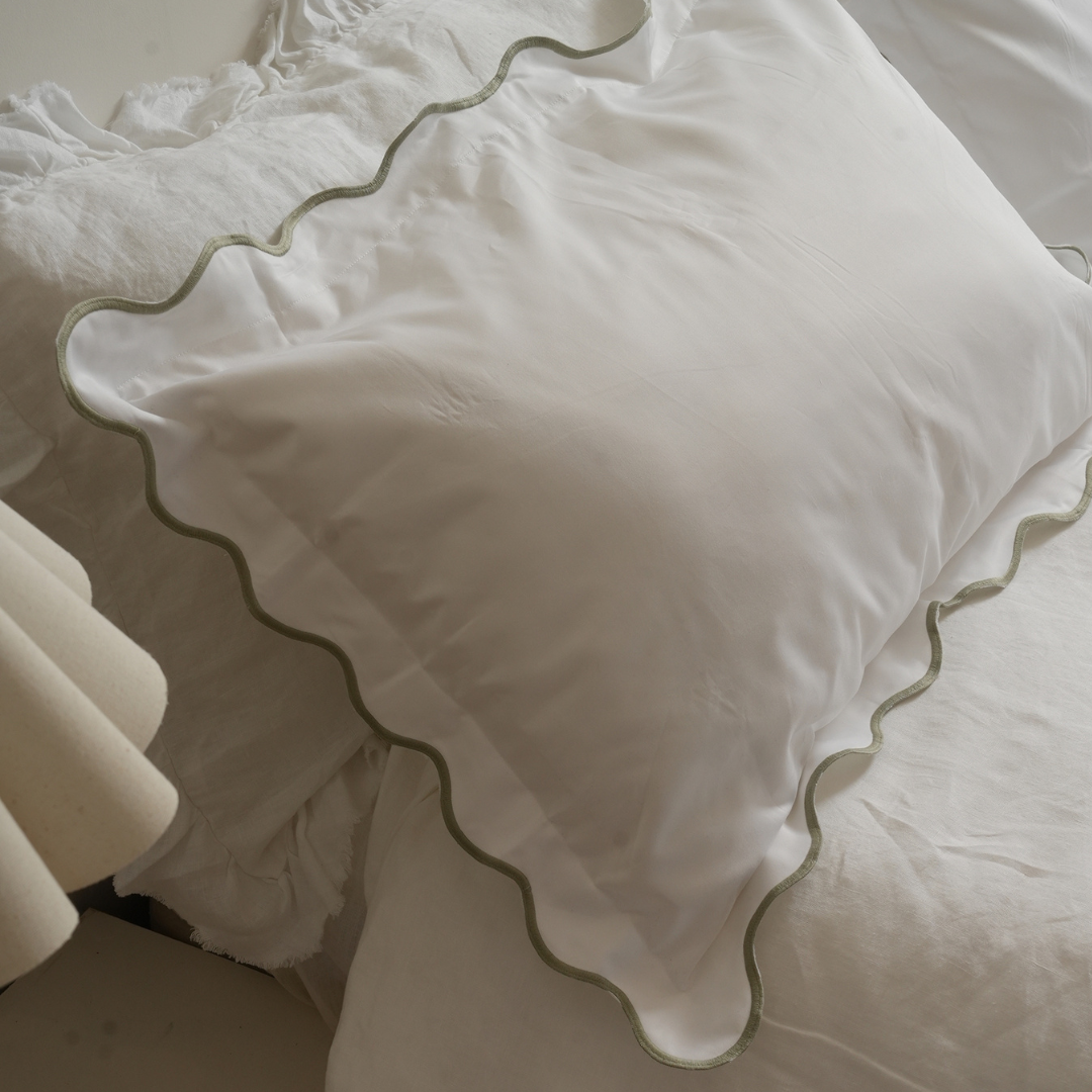 Celine pillowcase pair in sage, detail view