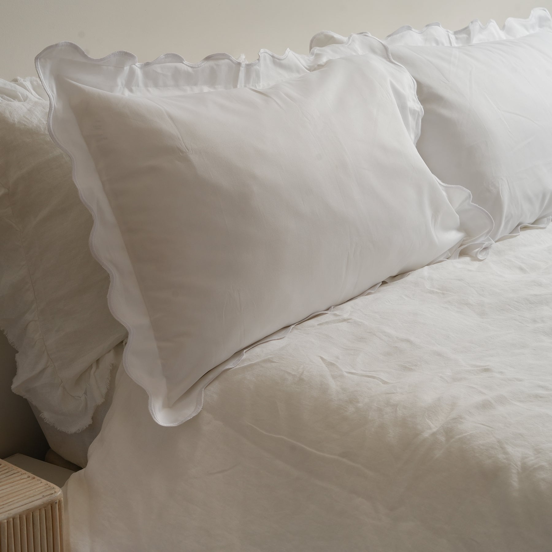 Celine pillowcase pair in white, styled shot
