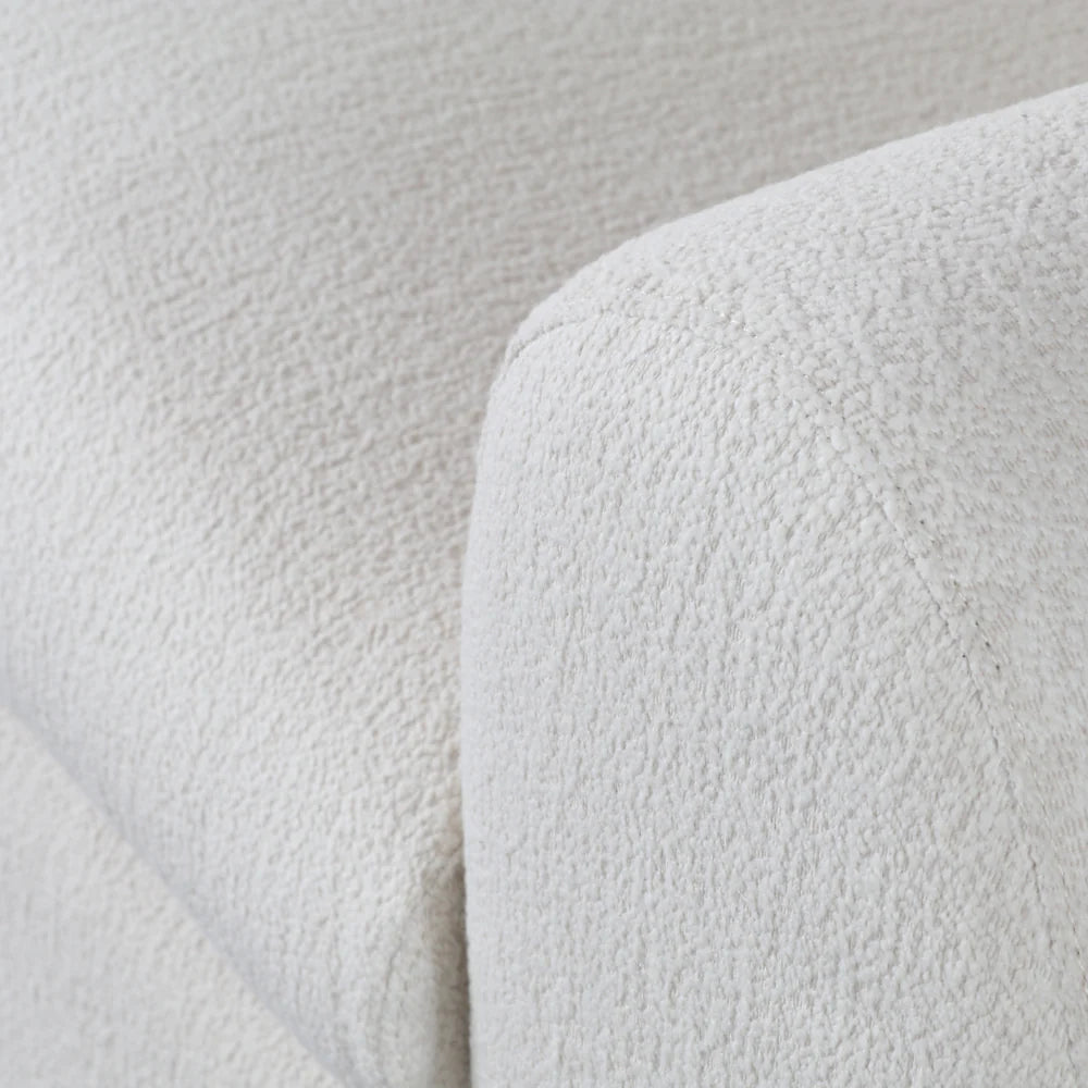 Channelled boucle sofa, styled shot
