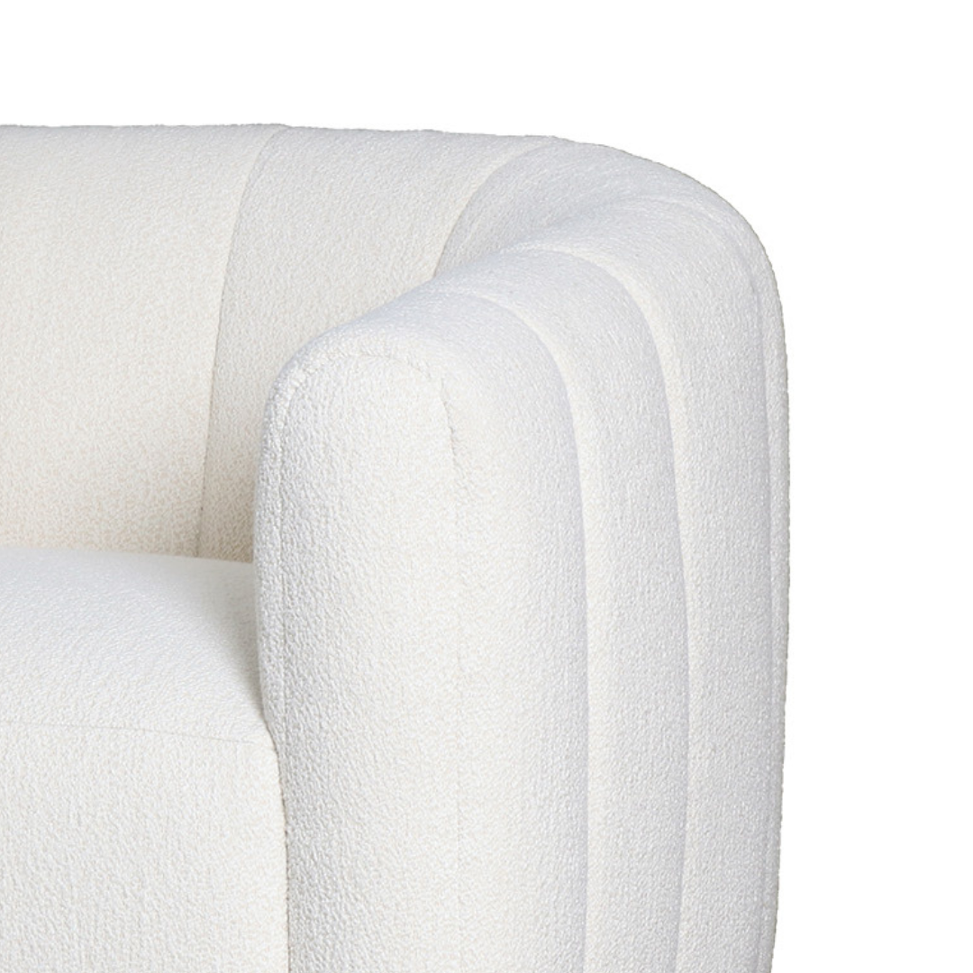 Channelled boucle swivel armchair, close-up