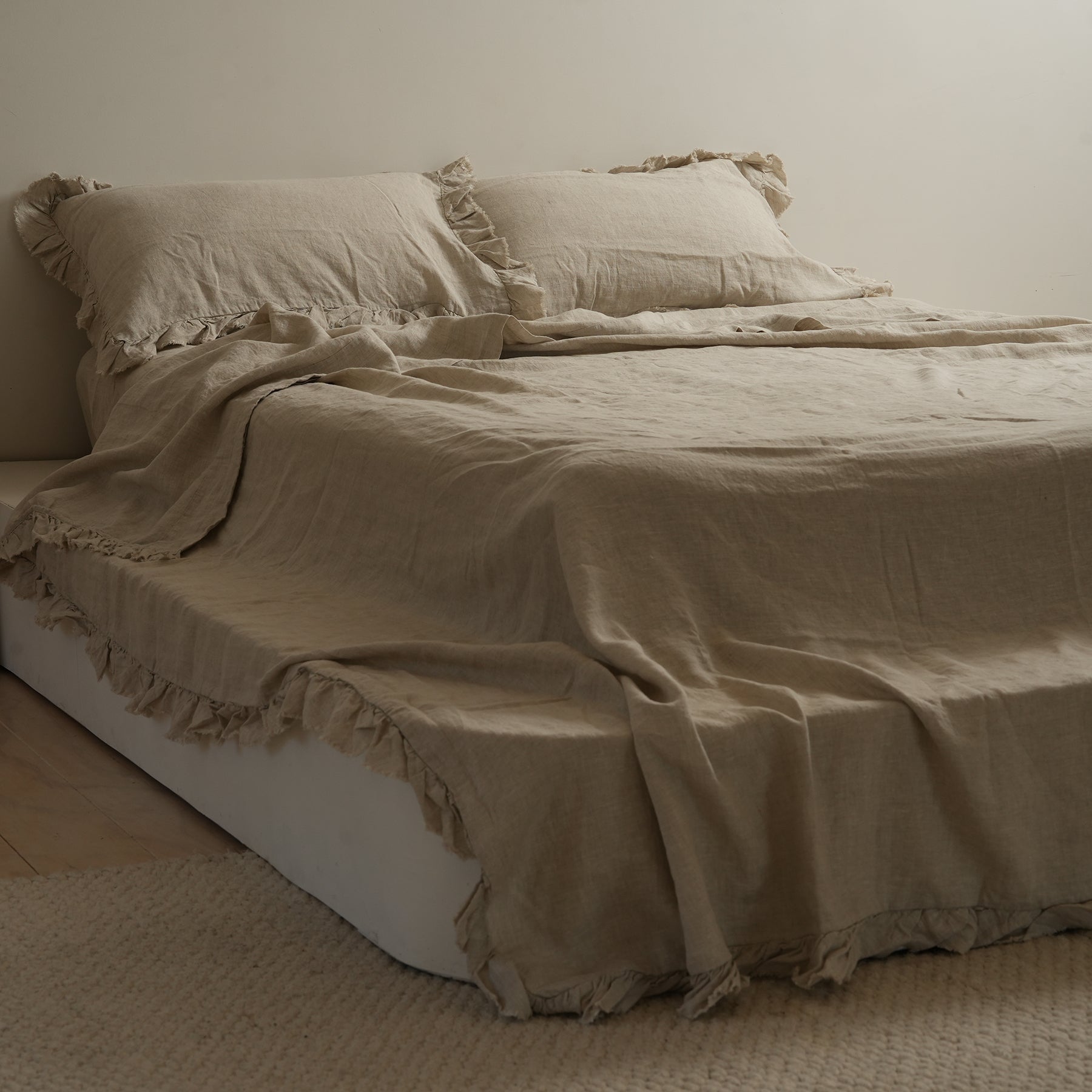 French flax linen ruffle edge sheet set in Natural Oat side view