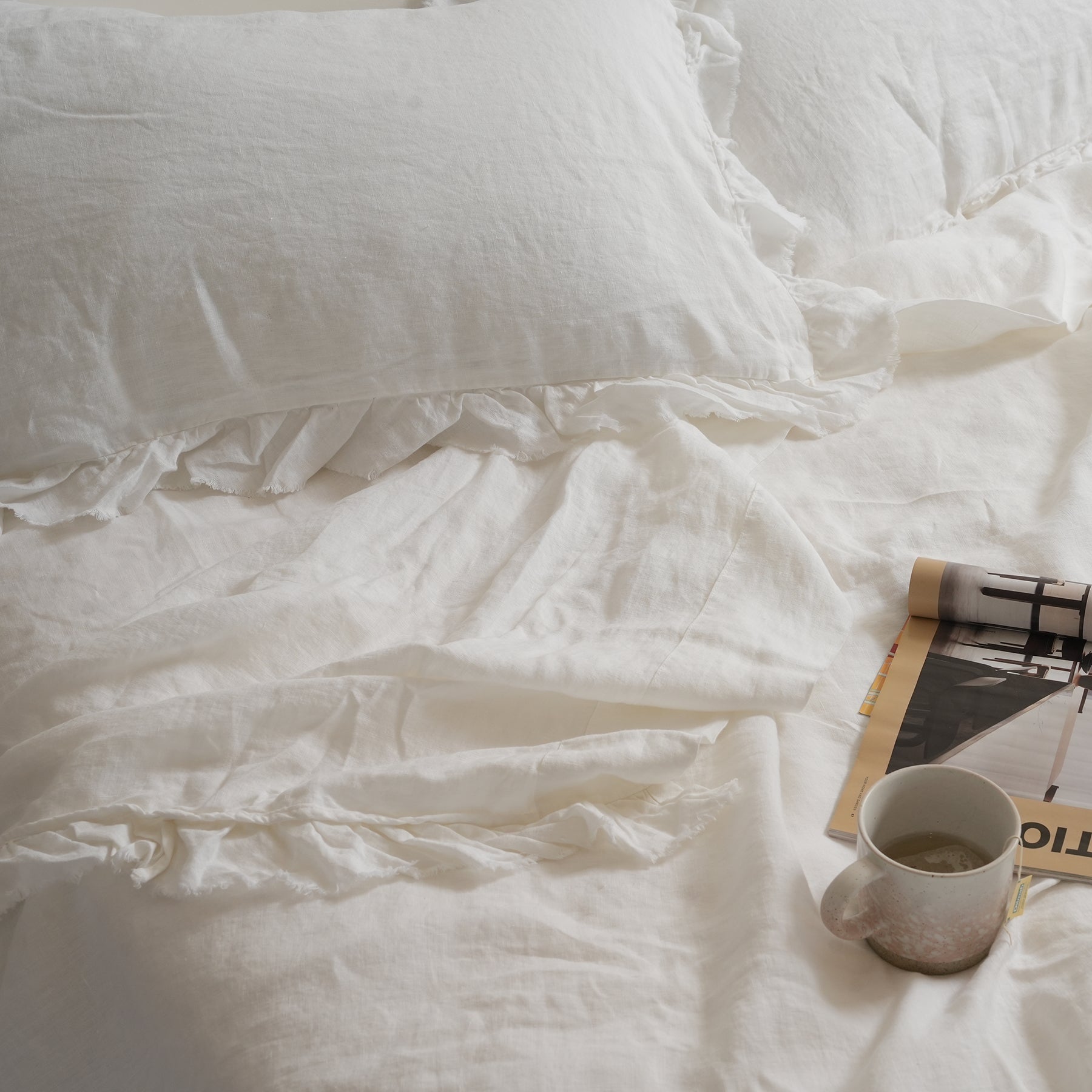 French flax linen ruffle edge sheet set in White close-up of fabric