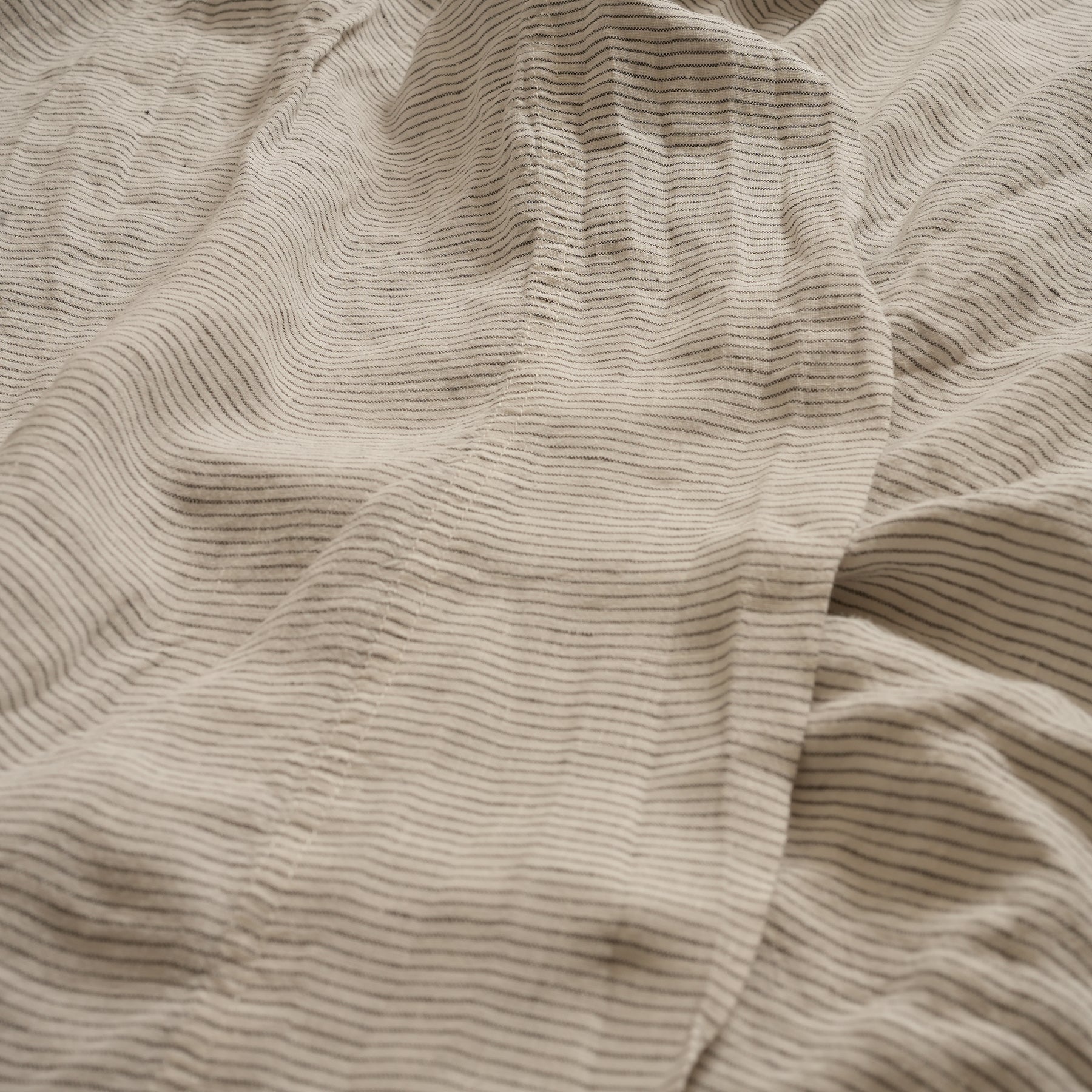 French flax linen sheet set in Charcoal Pinstripe side view