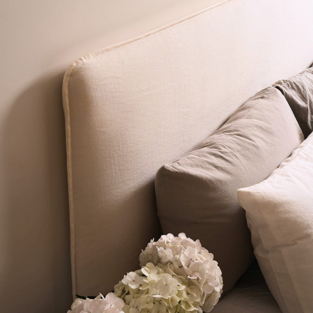 Harlow slip cover headboard in Ivory detail view