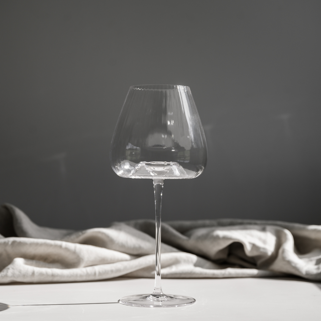 Melted crystal red wine glass in set of 4, close-up