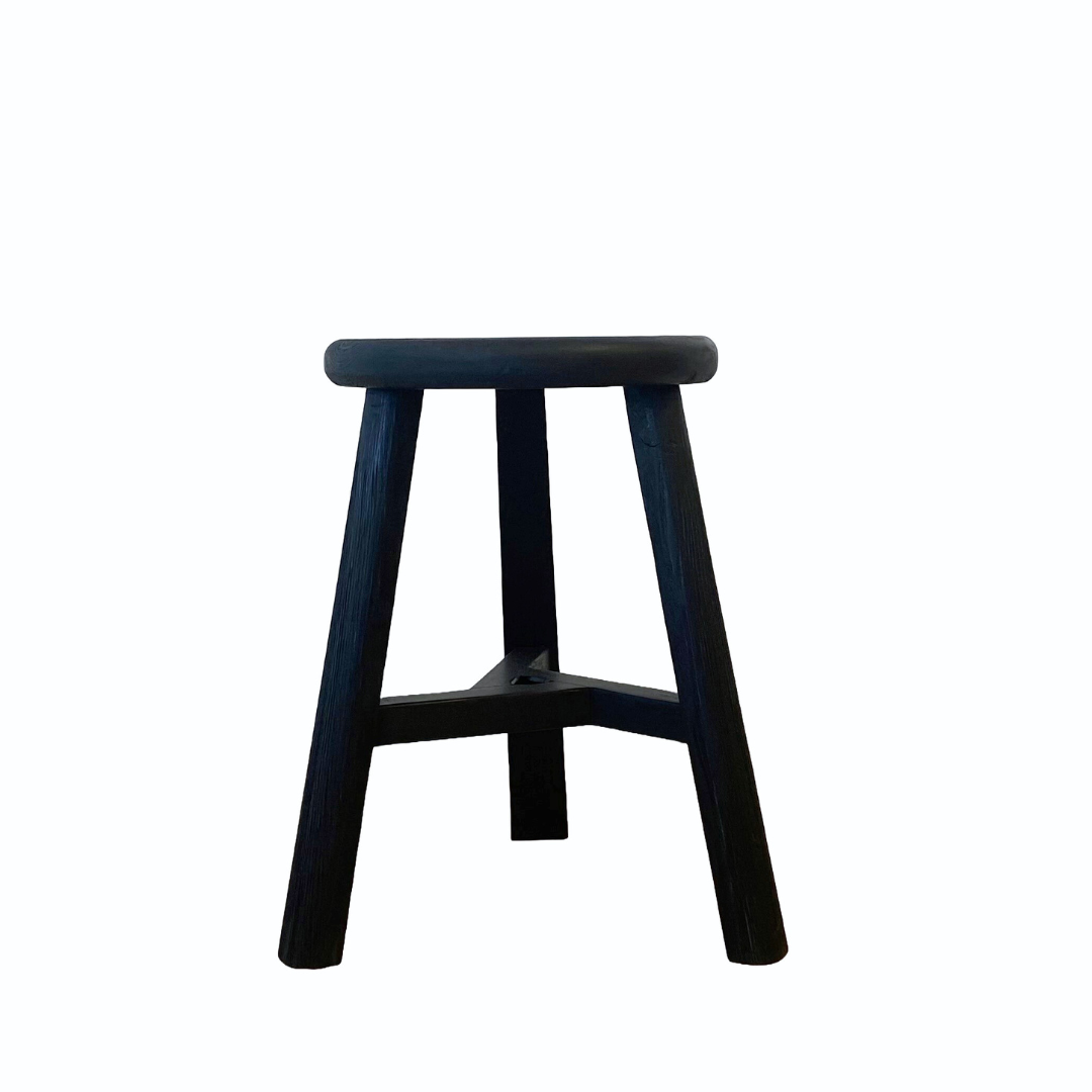 Reclaimed wooden tripod stool in black, detail view
