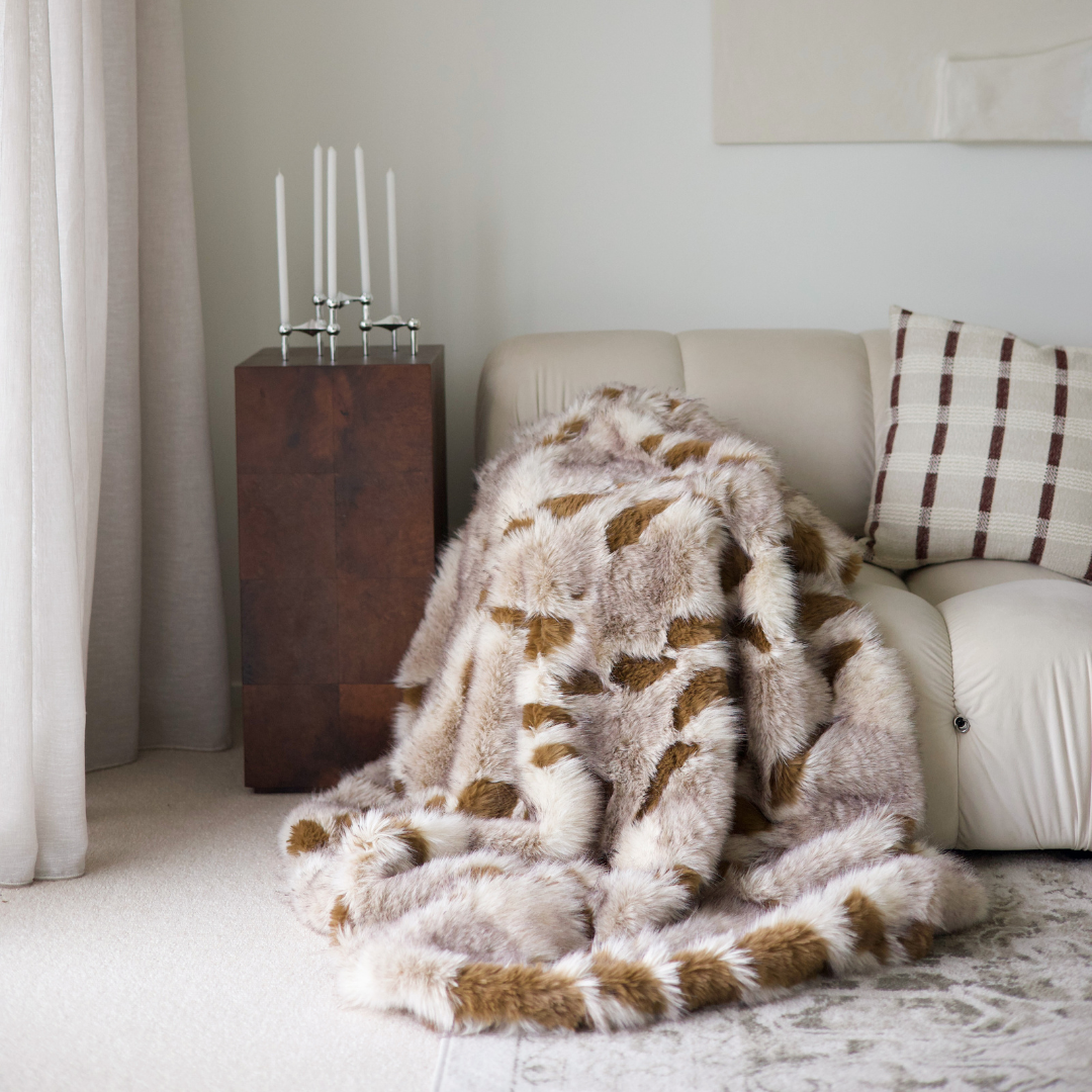 Serene vegan fur throw in multi