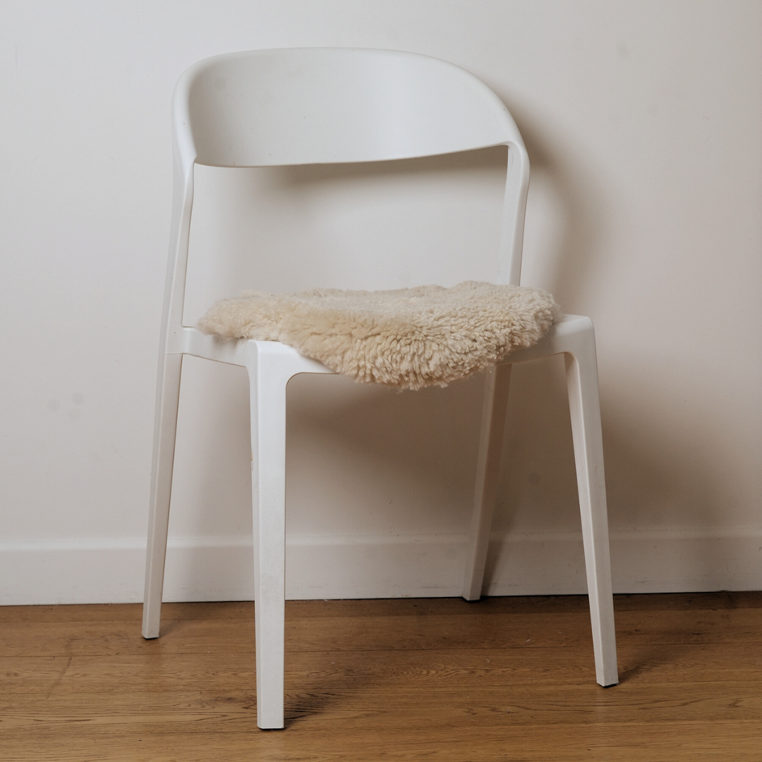 Shorn sheepskin seat warmer in Cream