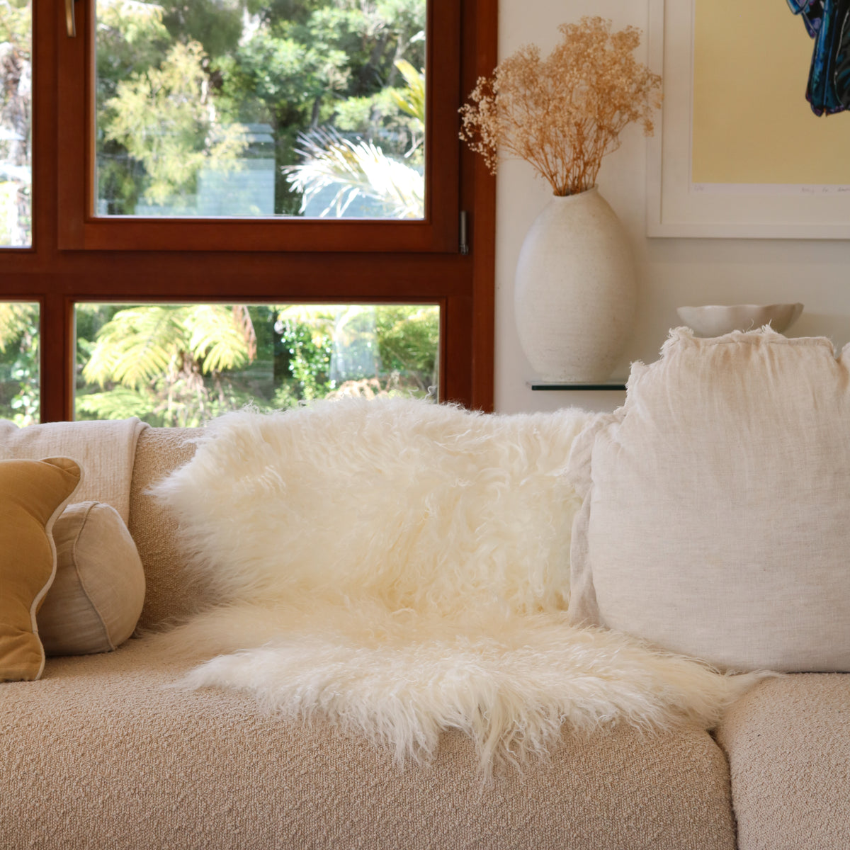 Tibetan lambskin rug in Ivory, long curly lambswool pile, detail view