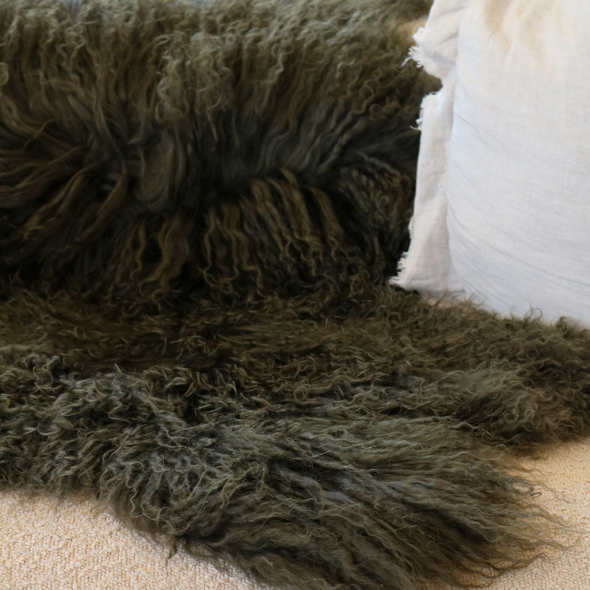Tibetan lambskin rug in Olive, long curly lambswool pile, detail view
