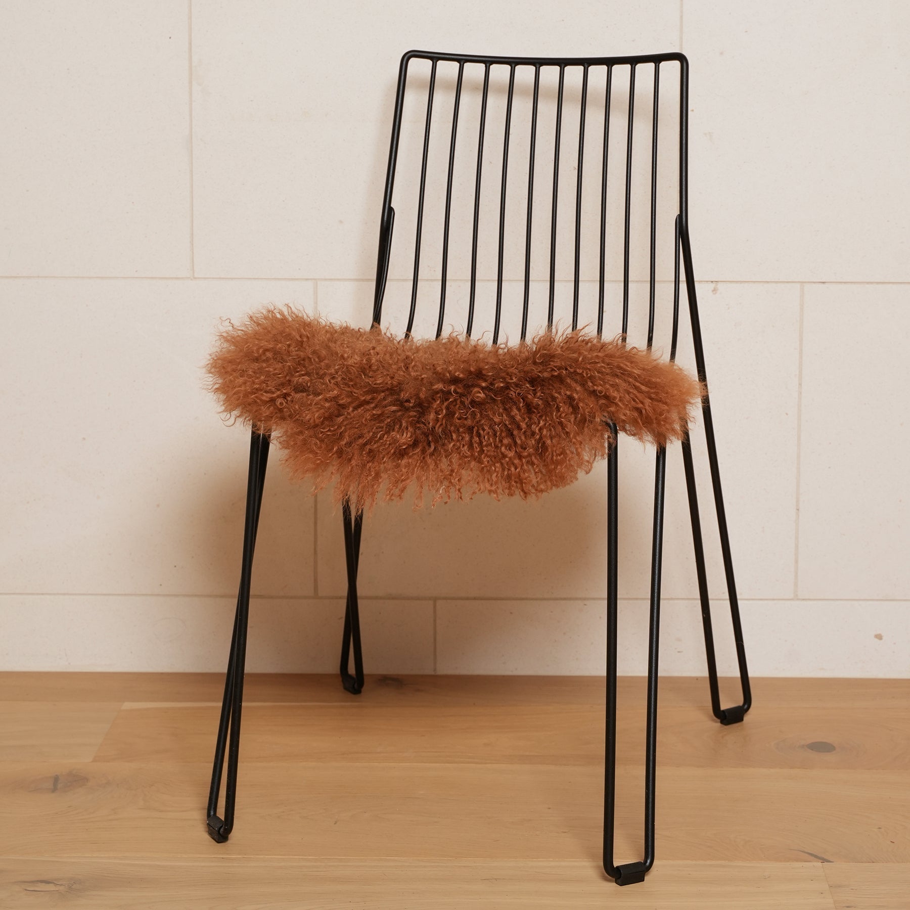 Tibetan lambskin seat warmer in Caramel detail view