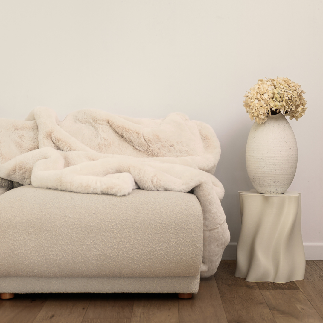 Vegan fur throw in big bear cream, styled shot