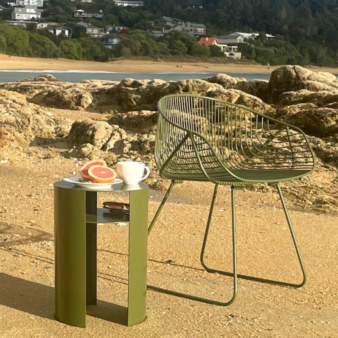 Waipuna table in stainless steel - fern, styled shot